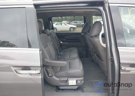 2013 Honda Odyssey Touring z USA, uszkodzony, nr VIN 5FNRL5H94DB013310